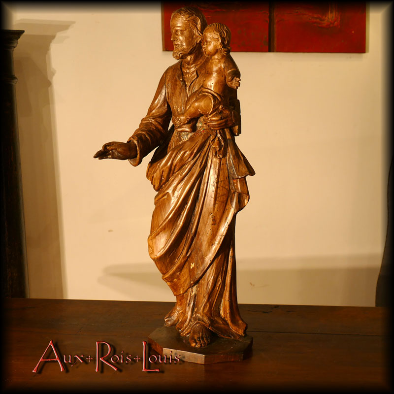 Walnut sculpture – Saint Joseph and the Christ Child – 18ᵗʰ century – South-West France