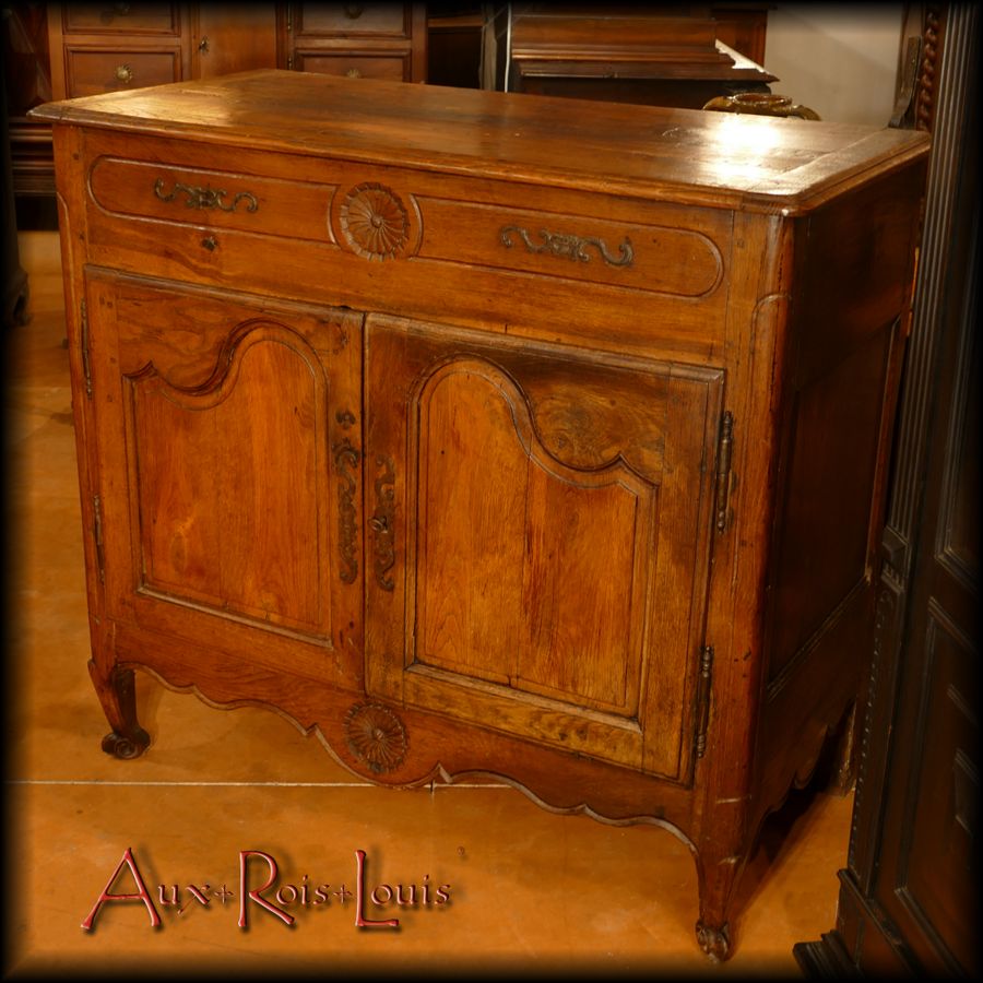 Astonishing trompe-l'oeil fantasy on this little sideboard which seems to have two drawers even though it opens on the top like a trunk.