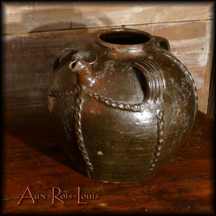 The smaller oil jug has a more sustained glaze, burnt sienna - [PA063]