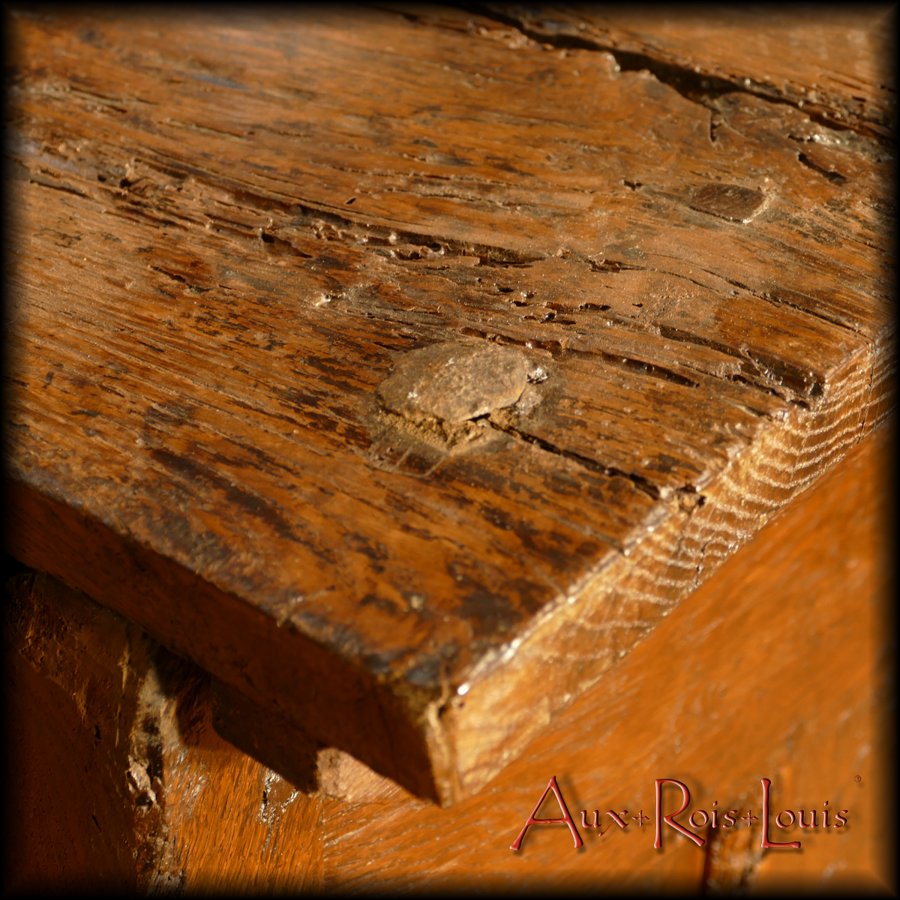 The planks of the tray are maintained on this curve using large forged nails.