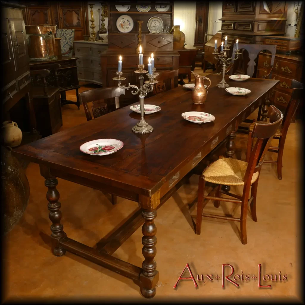 Large walnut community table from a monastery in the South West of France. It is three meters long and can easily accommodate a dozen guests.