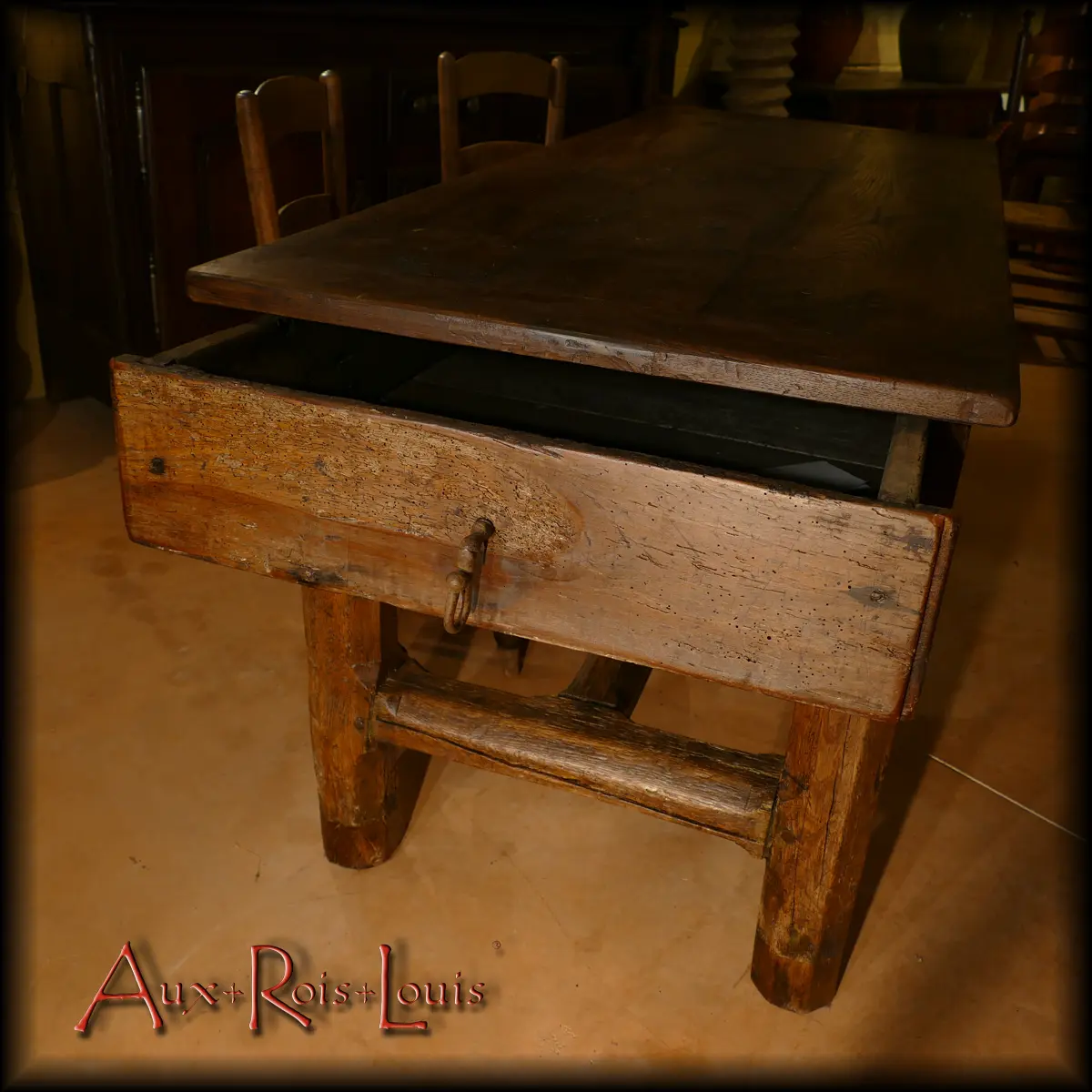 The large drawer of this Auvergne oak table housed the loaves of bread, baked in the bread oven for the whole week.